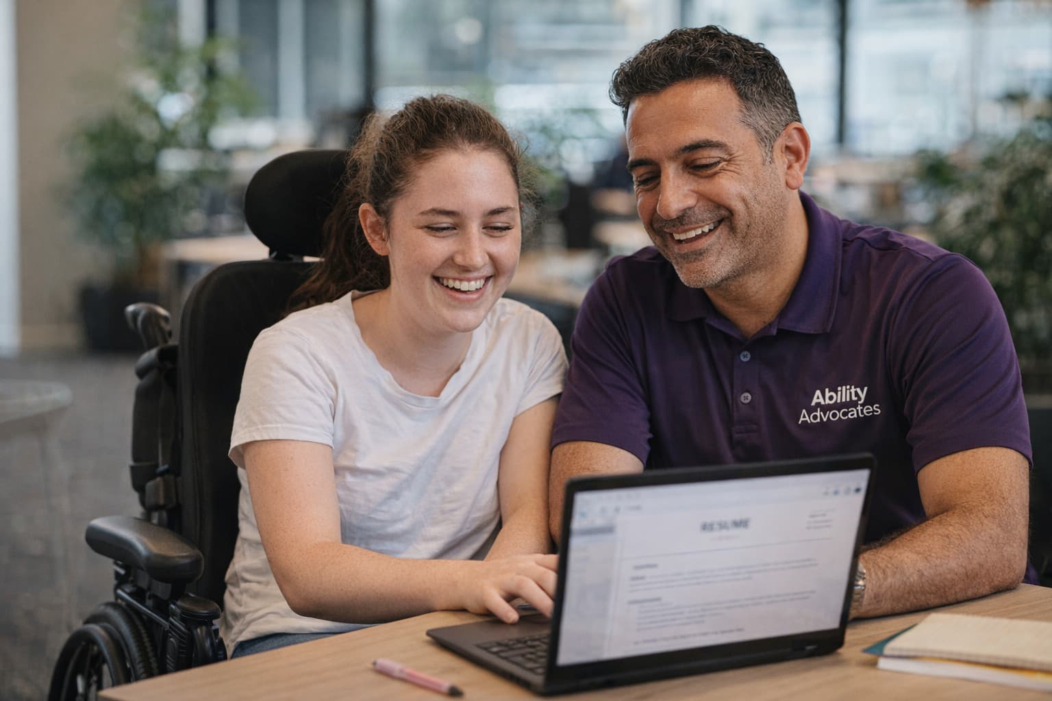 Young woman with disability working with Ability Advocates employment support